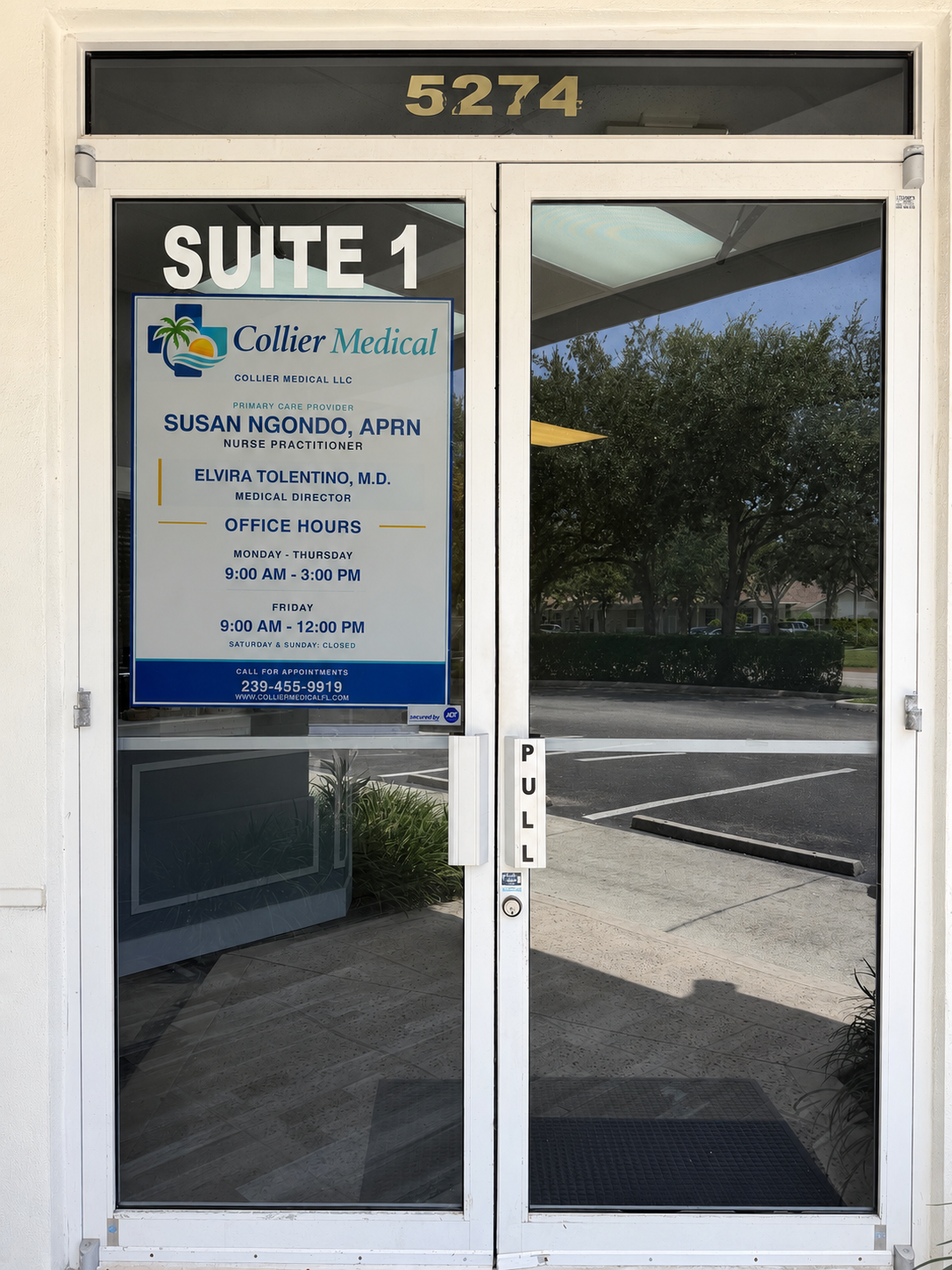 Entrance to Collier Medical at Suite 1 with the office sign clearly visible